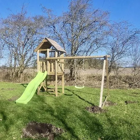Holiday home Familienferienhaus-Mit-Ofen-Spielturm-Und-Zwei-Terrassen